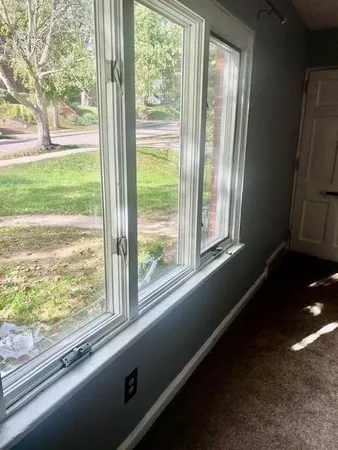 a view of a room that has a window in it
