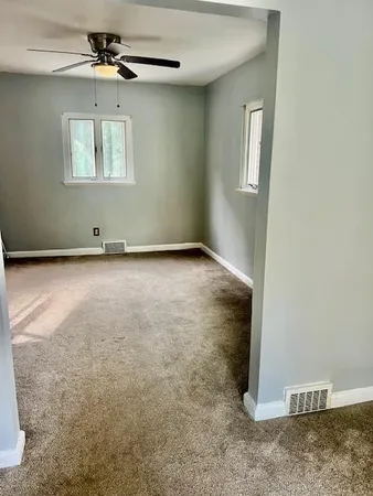 a view of an empty room with window