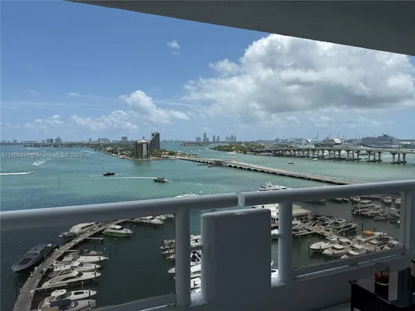 a view of a lake with a big yard