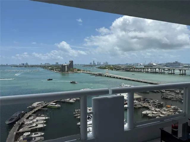 a view of a lake with a big yard