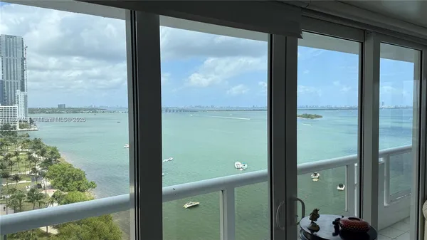 a view of a glass door and porch