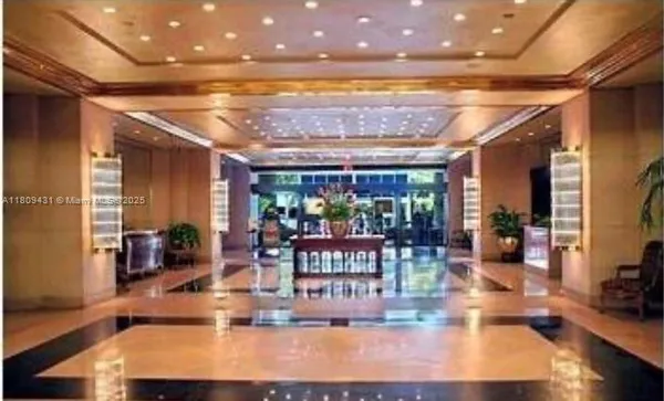 a view of a living room and dining room