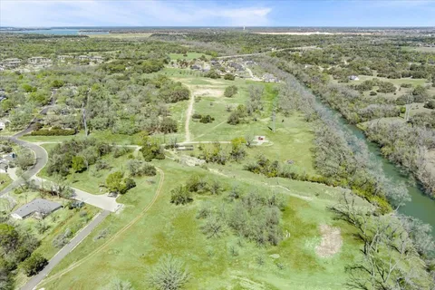 a view of a field with an outdoor space