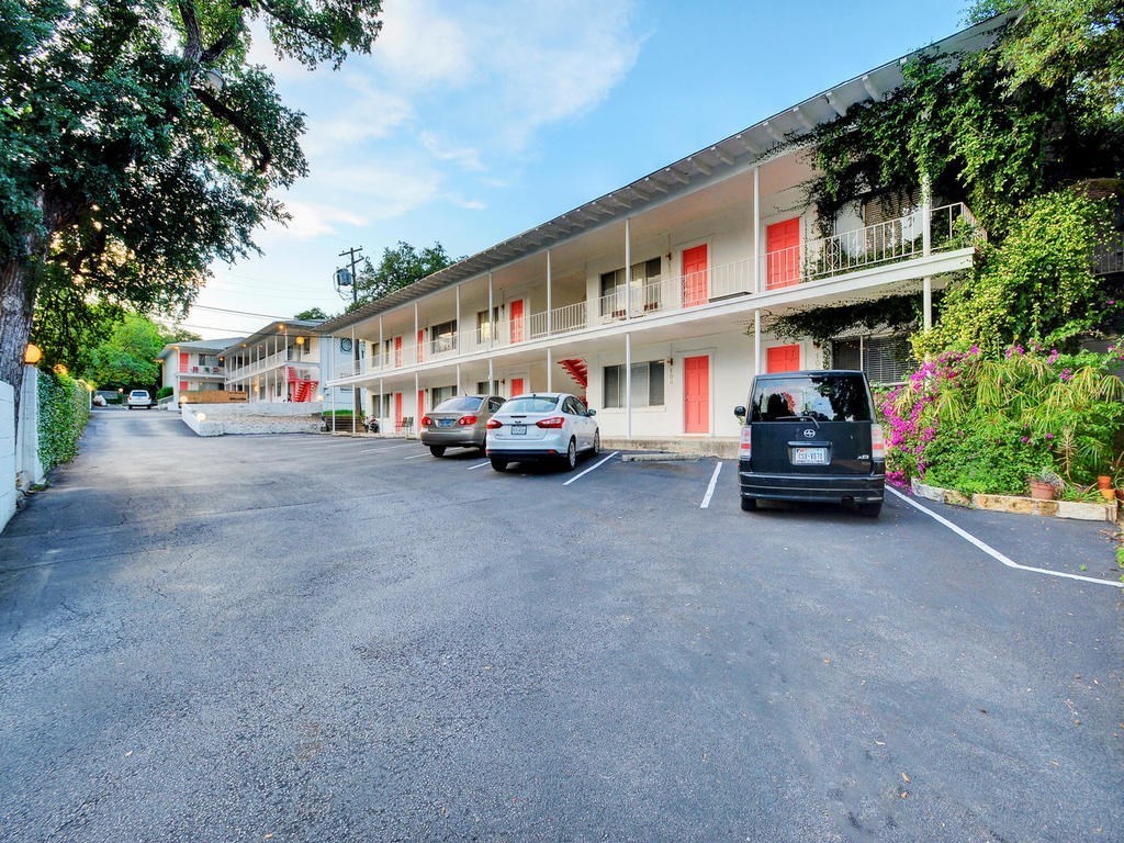 a car parked in front of a building