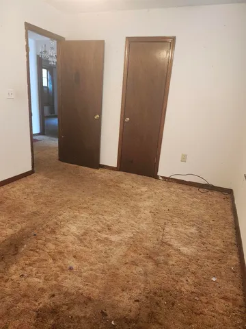 an empty room with closet