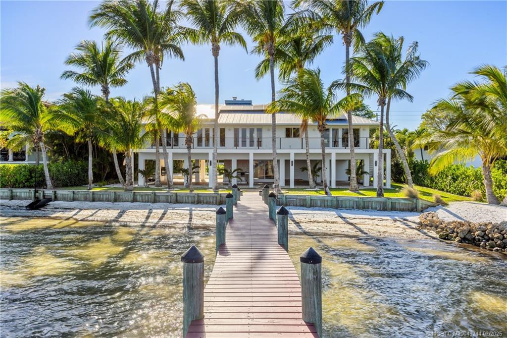 10 South Sewalls Point Road Stuart, FL 34996 - Photo 23 of 79 a view of swimming pool with palm trees