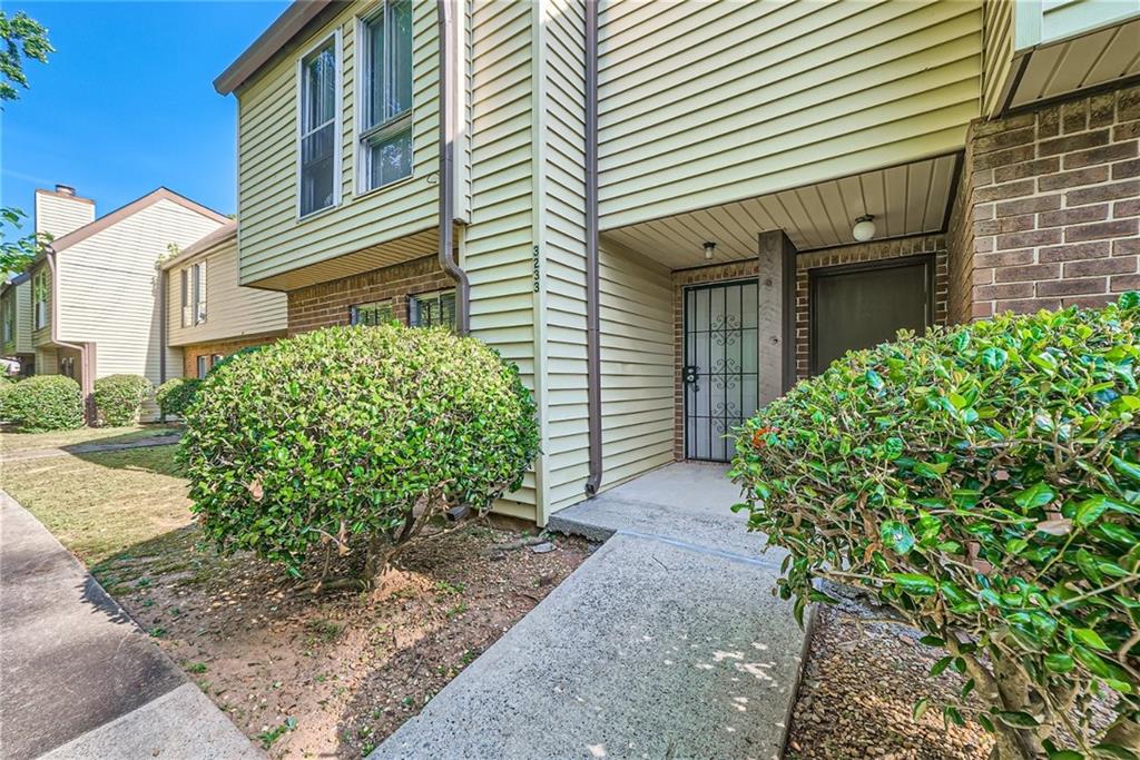 3233 Strawberry Lane Decatur, GA 30034 - Photo 1 of 1 a front view of a house with garden