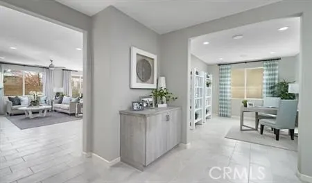 a living room with furniture and a table