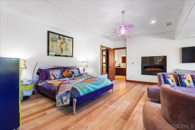 a living room with furniture rug and window