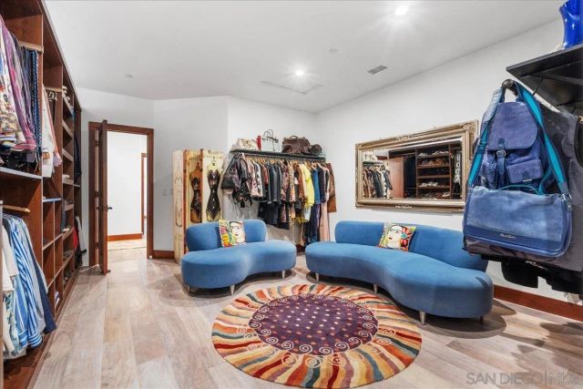 a view of a house with a yard and table and chair