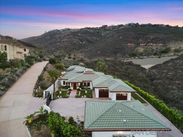 a view of a house with a garden