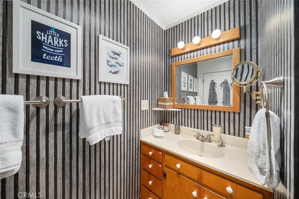 a bathroom with a shower and a door
