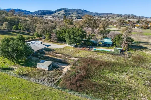 a view of a lake with a yard