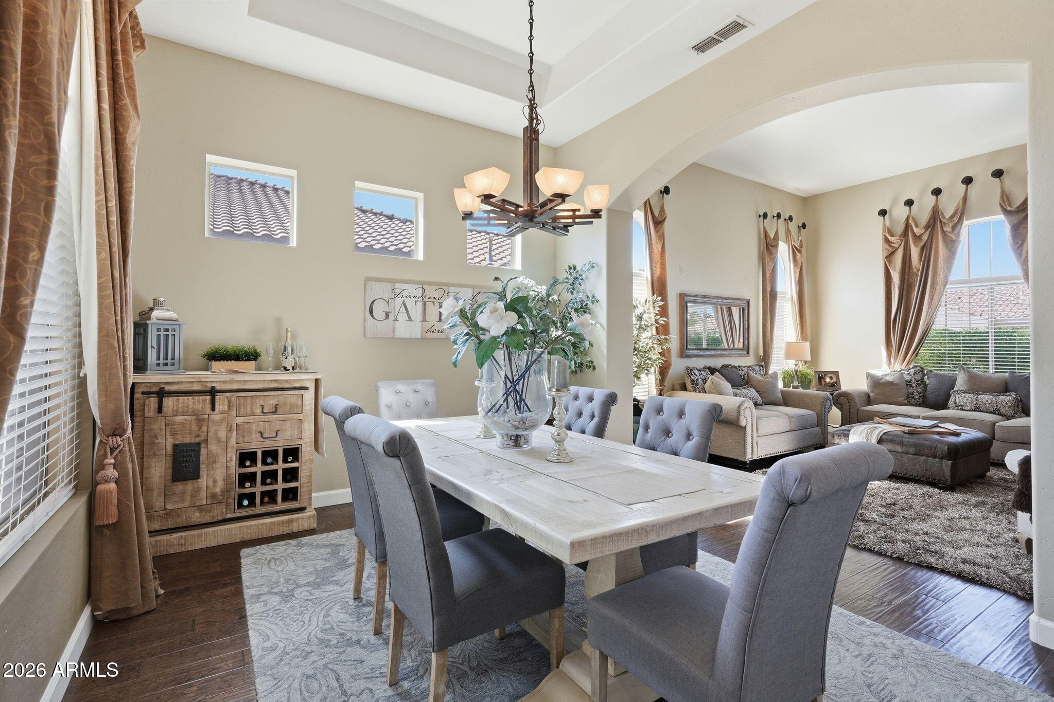 4021 East Kirkland Road Phoenix, AZ 85050 - Photo 13 of 35 a view of a dining room with furniture window and wooden floor