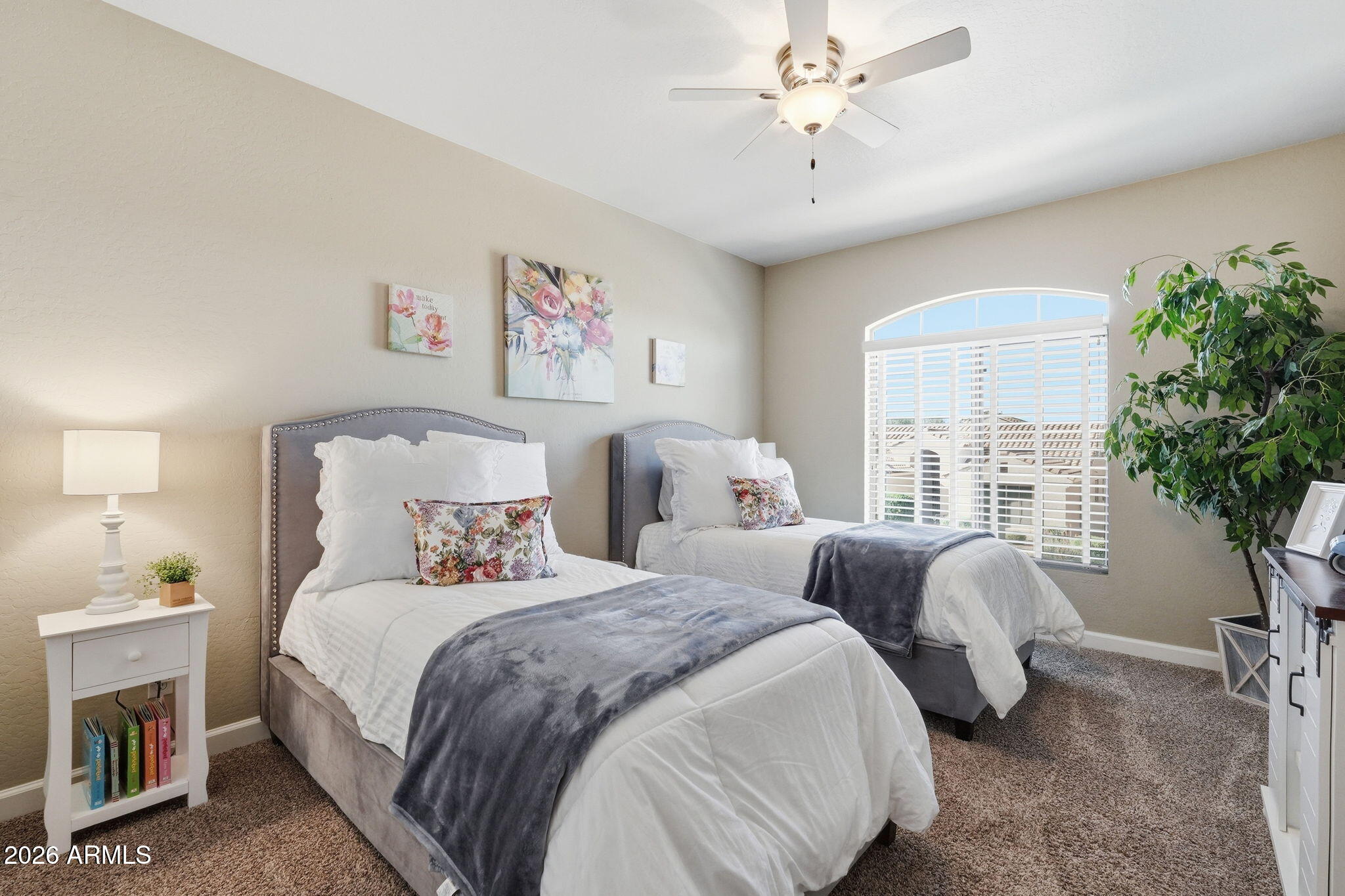 4021 East Kirkland Road Phoenix, AZ 85050 - Photo 23 of 35 a bedroom with two beds and a potted plant