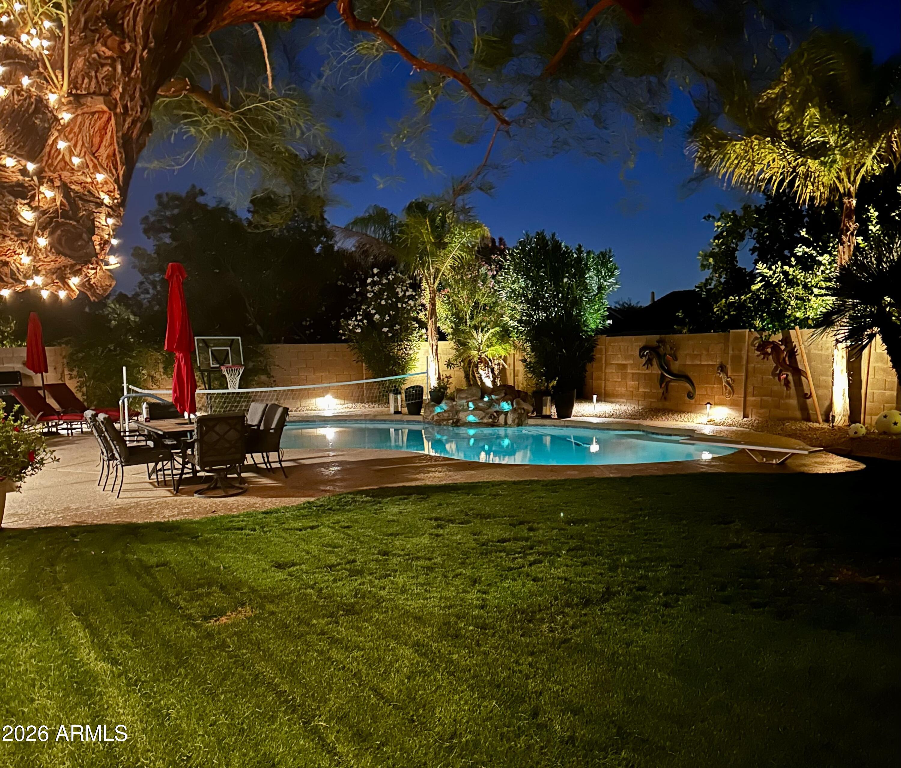 4021 East Kirkland Road Phoenix, AZ 85050 - Photo 32 of 35 a view of a swimming pool with an outdoor space and seating area