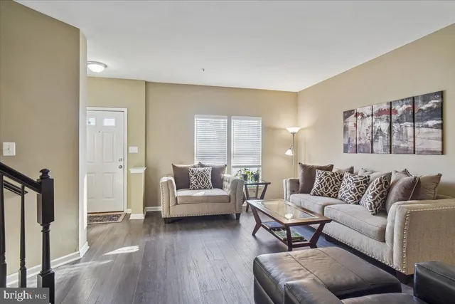 a living room with furniture and a couch