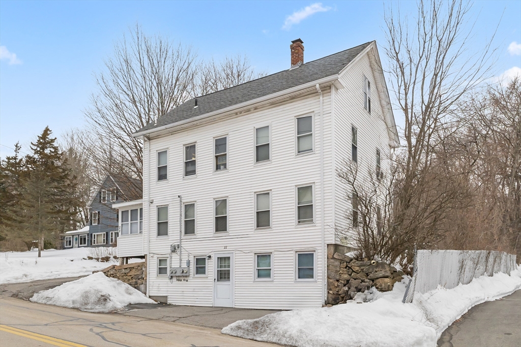 22 Gilboa Street Douglas, MA 01516 - Photo 2 of 21 a view of a white house with a large tree