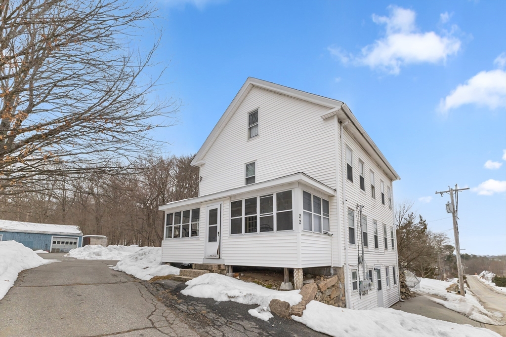 22 Gilboa Street Douglas, MA 01516 - Photo 3 of 21 a front view of a house with a yard