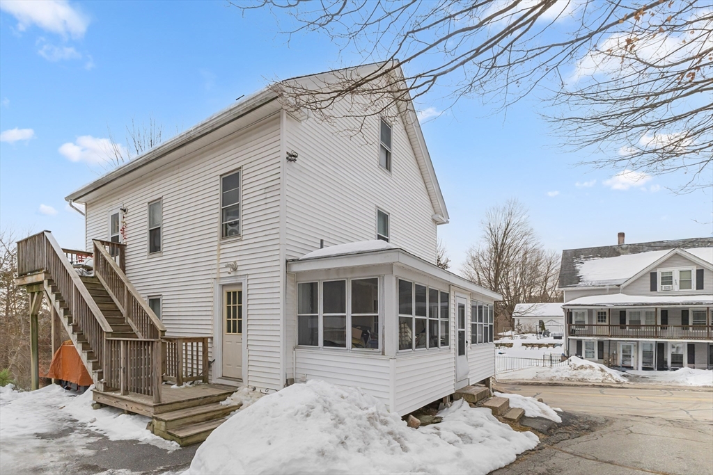 22 Gilboa Street Douglas, MA 01516 - Photo 4 of 21 a front view of a house with a porch