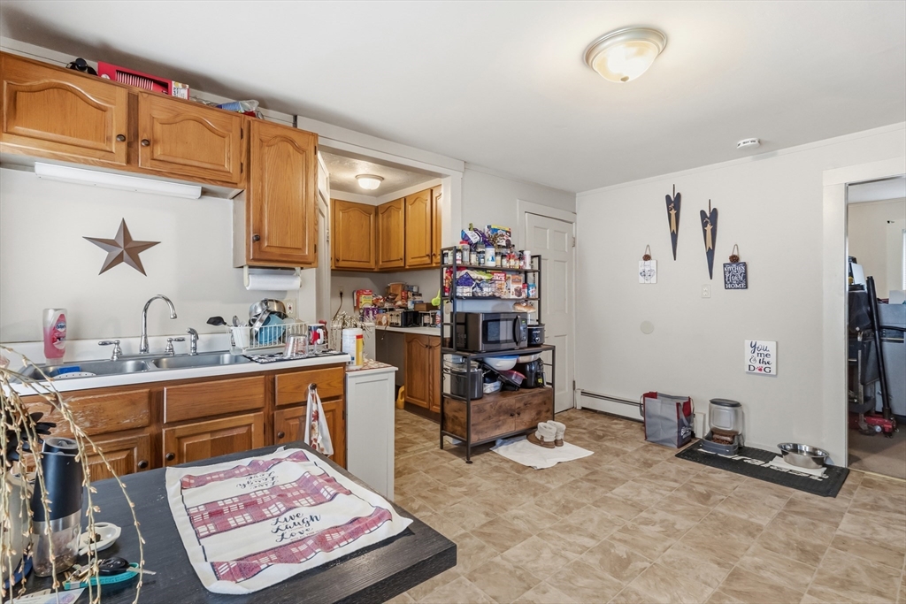 22 Gilboa Street Douglas, MA 01516 - Photo 7 of 21 a room with furniture and a rug