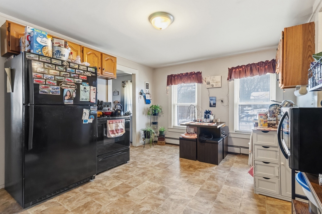22 Gilboa Street Douglas, MA 01516 - Photo 8 of 21 a living room with furniture and a flat screen tv