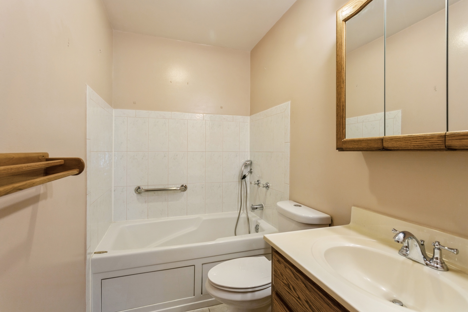 628 West Briarcliff Road Bolingbrook, IL 60440 - Photo 13 of 31 a bathroom with a sink toilet and shower