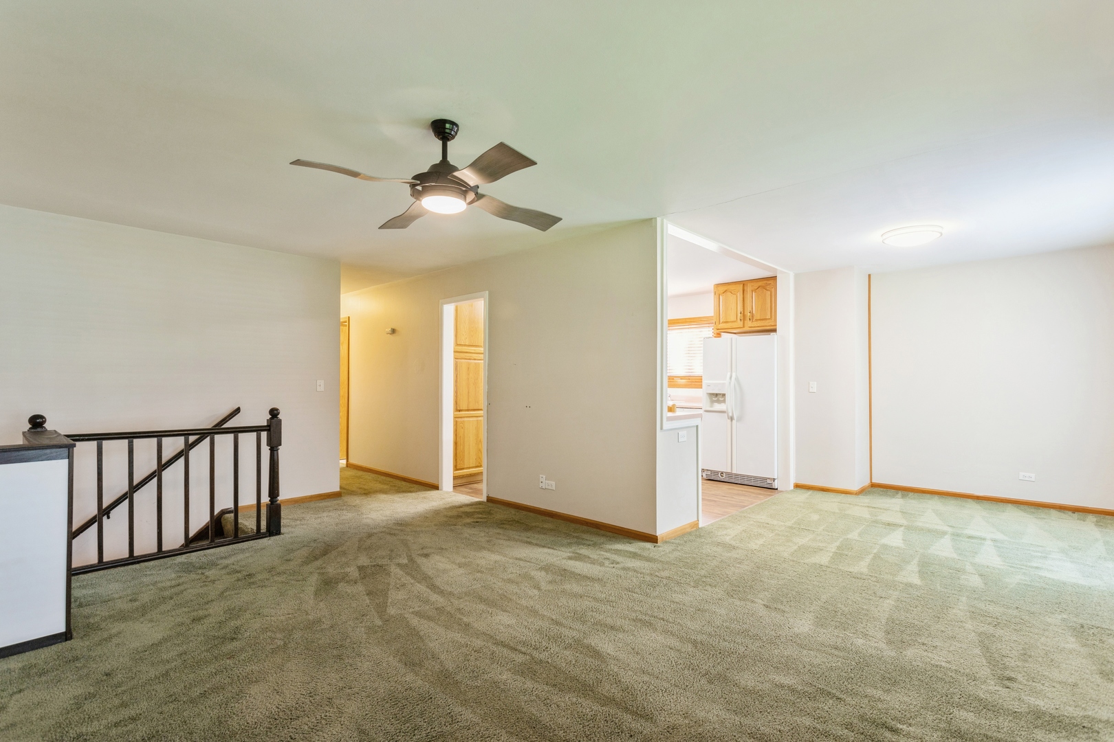 628 West Briarcliff Road Bolingbrook, IL 60440 - Photo 4 of 31 a view of empty room with ceiling fan