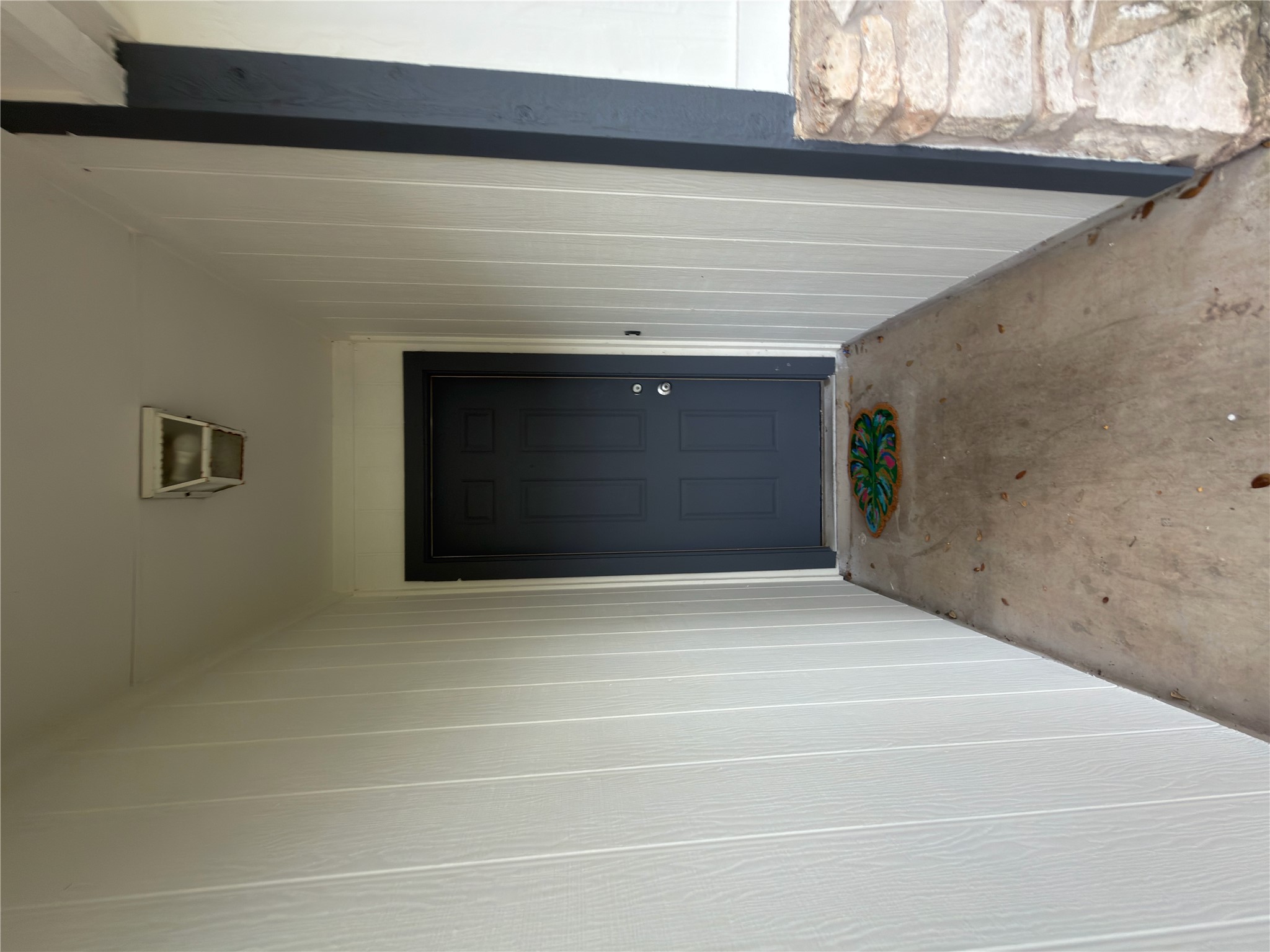 5601 Porsche Lane Austin, TX 78749 - Photo 23 of 38 a view of a hallway with wooden walls