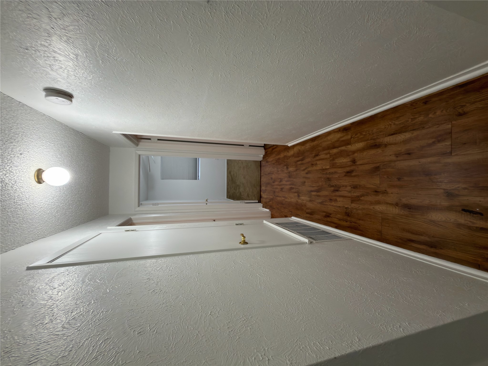 5601 Porsche Lane Austin, TX 78749 - Photo 26 of 38 a view of a hallway with wooden floor