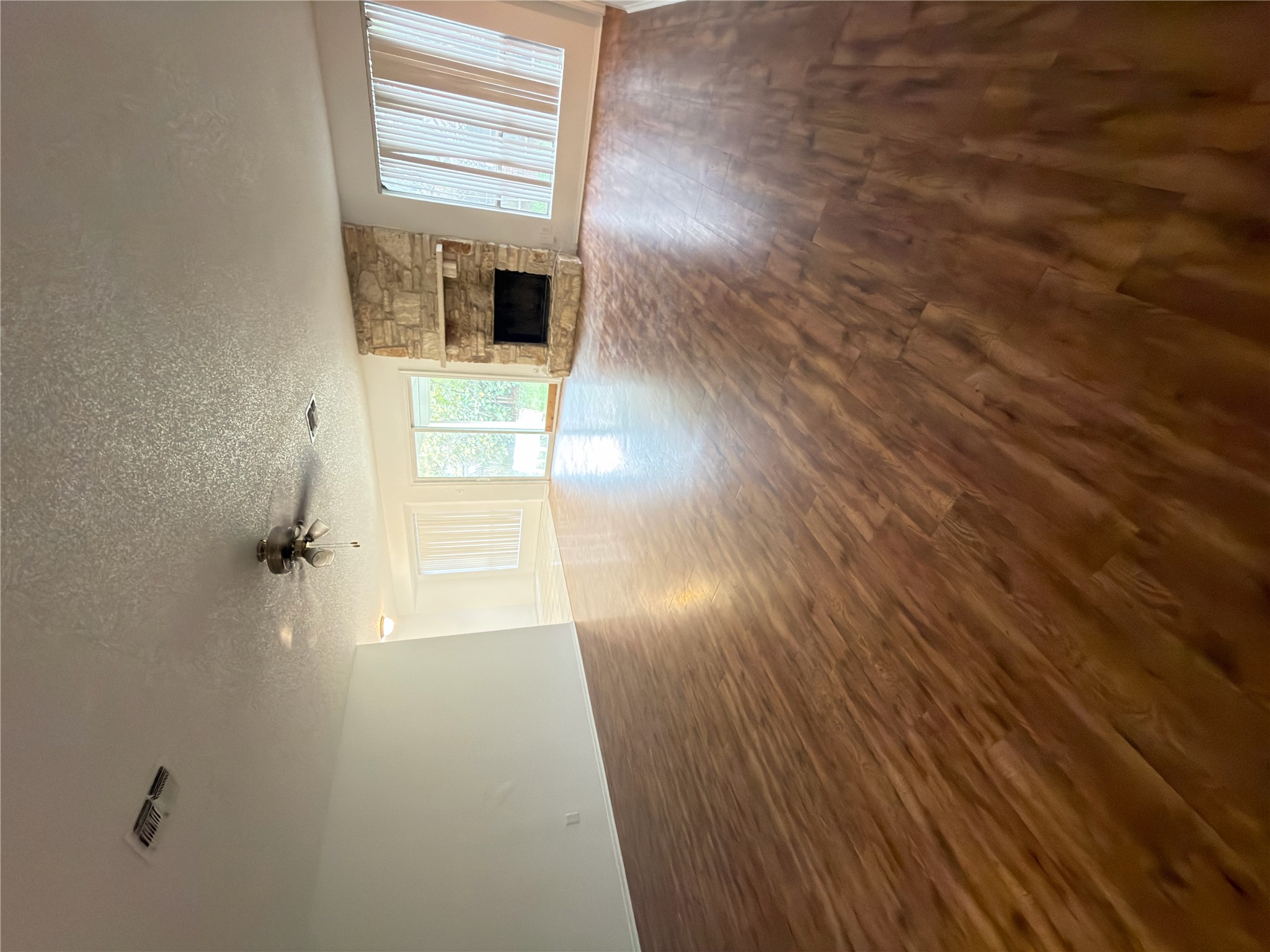 5601 Porsche Lane Austin, TX 78749 - Photo 35 of 38 wooden floor in an empty room with a window