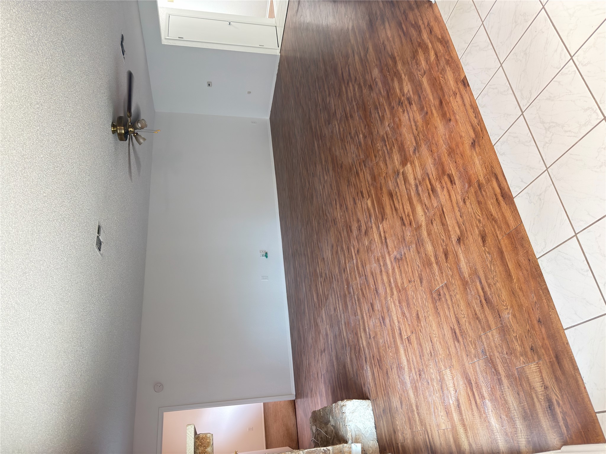 5601 Porsche Lane Austin, TX 78749 - Photo 37 of 38 a view of a room with an empty space and wooden floor