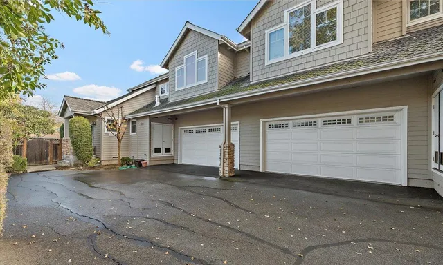 a front view of a house with a garage