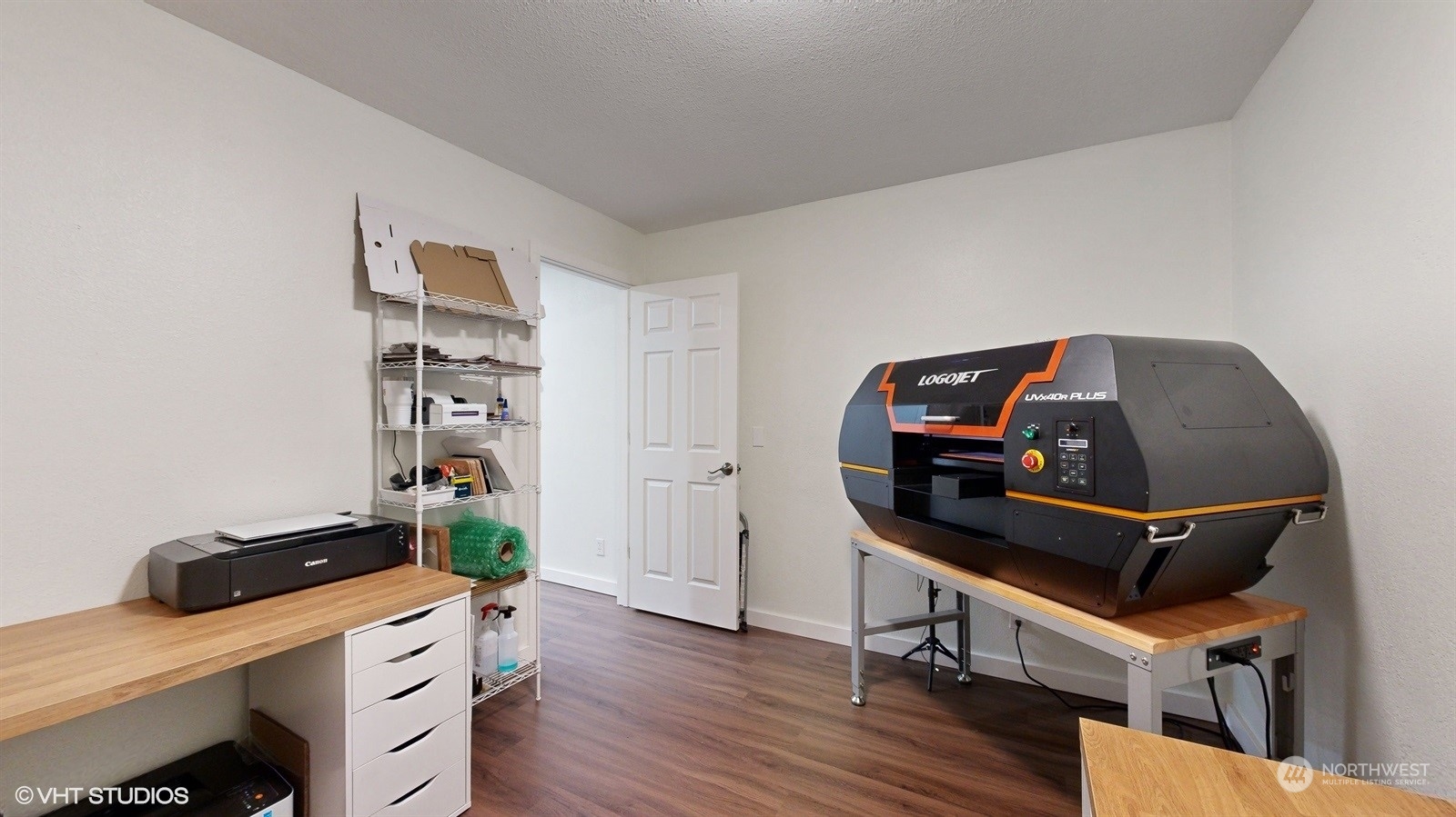 7933 191st Avenue Southwest Rochester, WA 98579 - Photo 15 of 36 a room with wooden floor and gym equipment