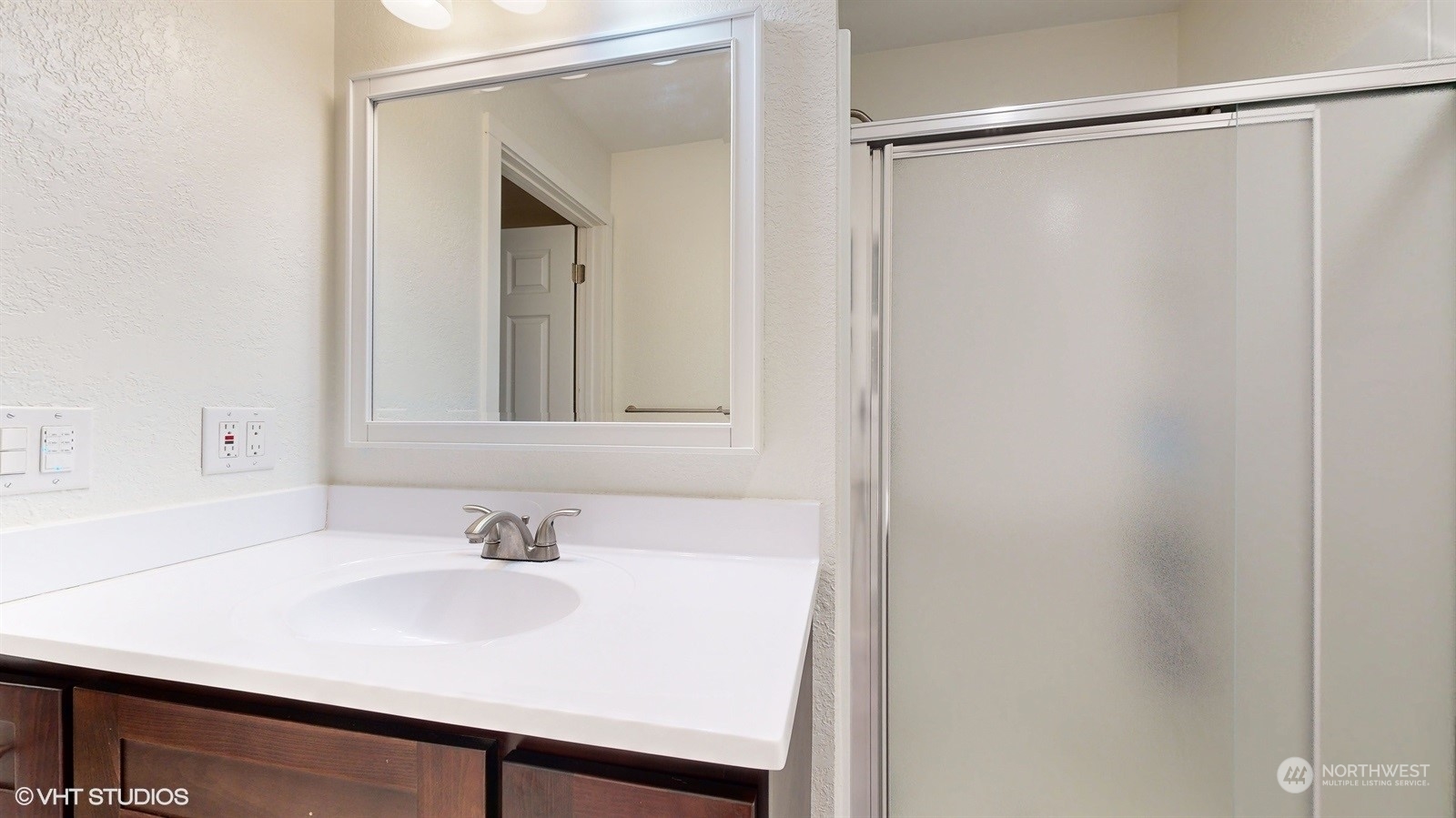 7933 191st Avenue Southwest Rochester, WA 98579 - Photo 23 of 36 a bathroom with a sink and a mirror