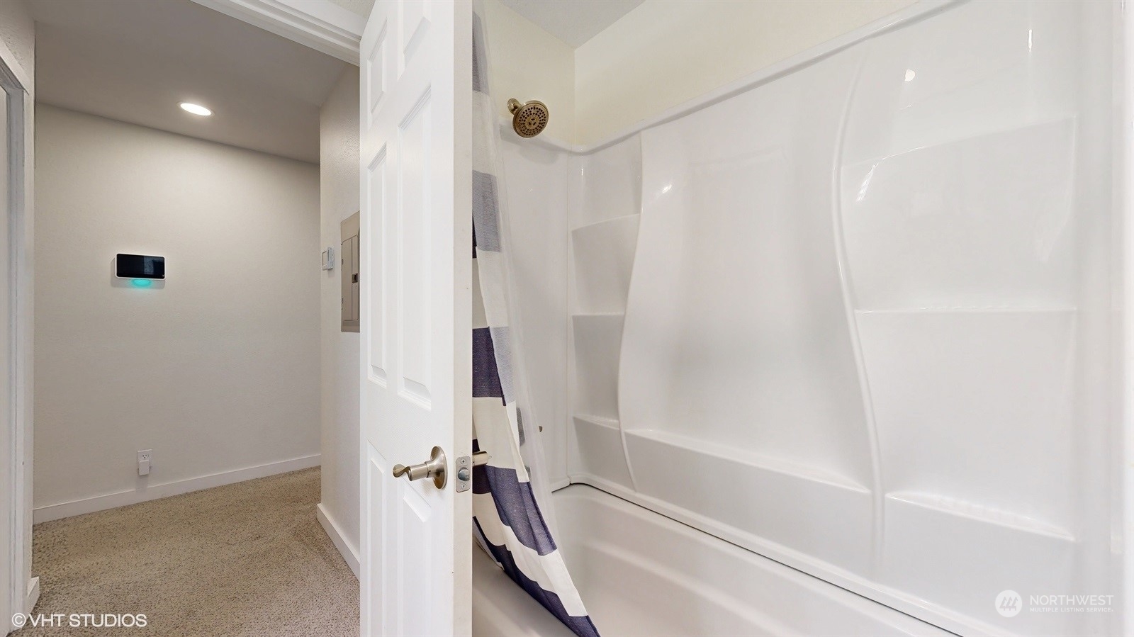 7933 191st Avenue Southwest Rochester, WA 98579 - Photo 25 of 36 a bathroom with a bathtub and a shower