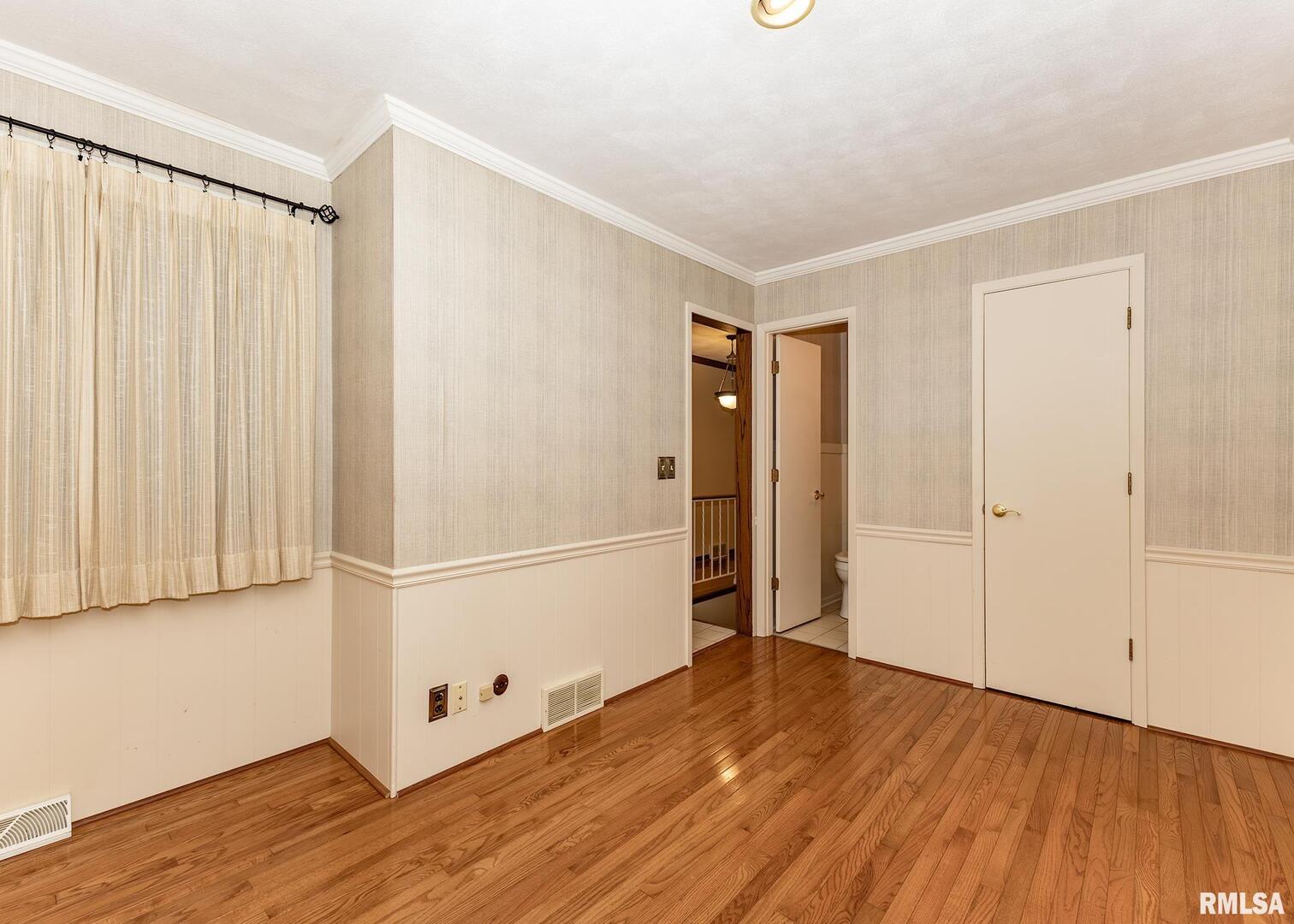 3407 41st Street Moline, IL 61265 - Photo 11 of 25 a view of a room with wooden floor