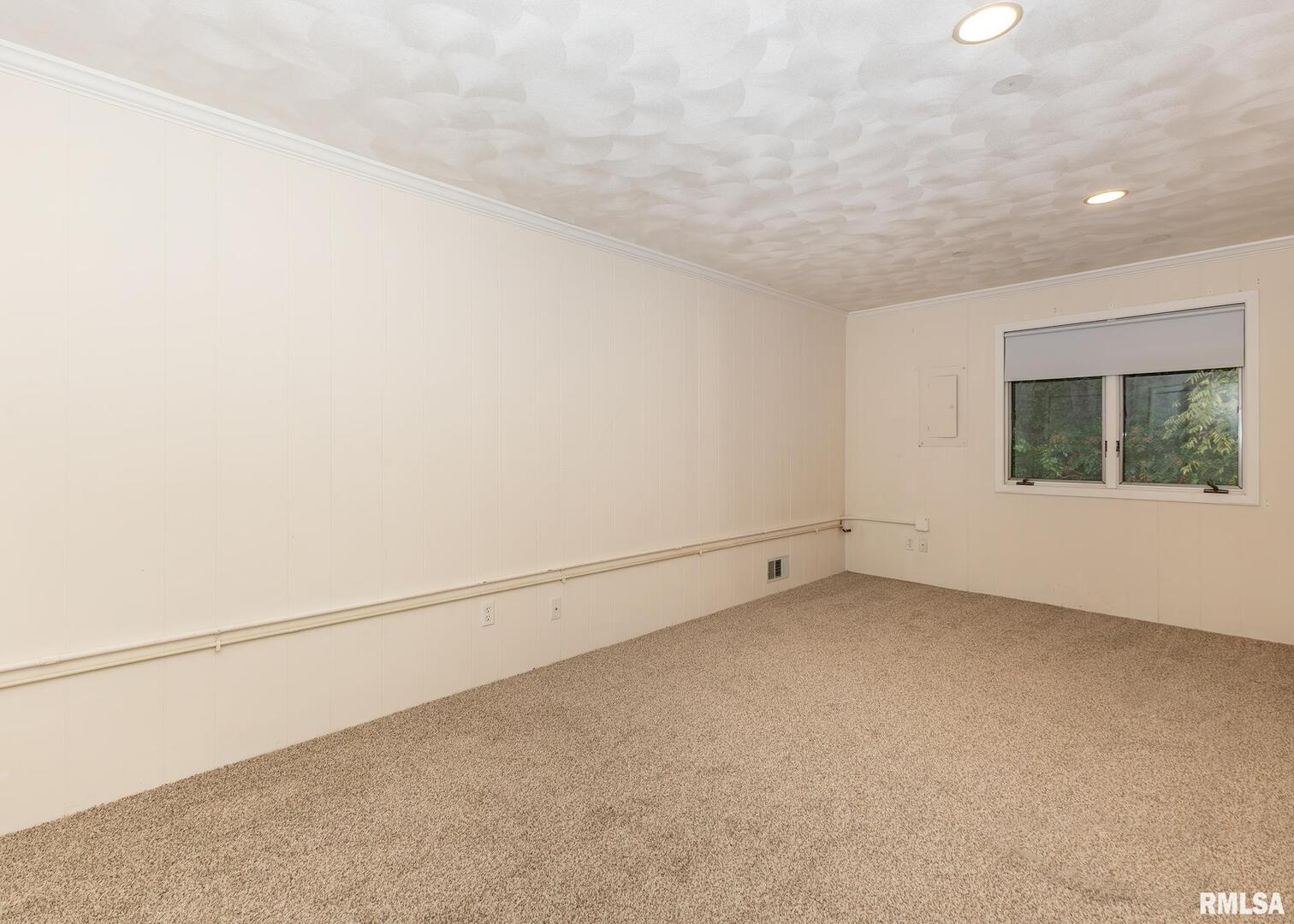 3407 41st Street Moline, IL 61265 - Photo 16 of 25 an empty room with a window