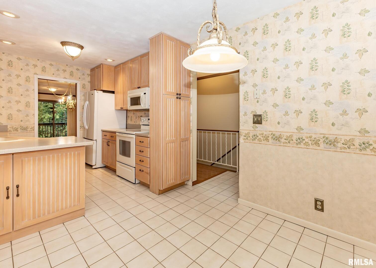 3407 41st Street Moline, IL 61265 - Photo 7 of 25 a view of a kitchen with kitchen