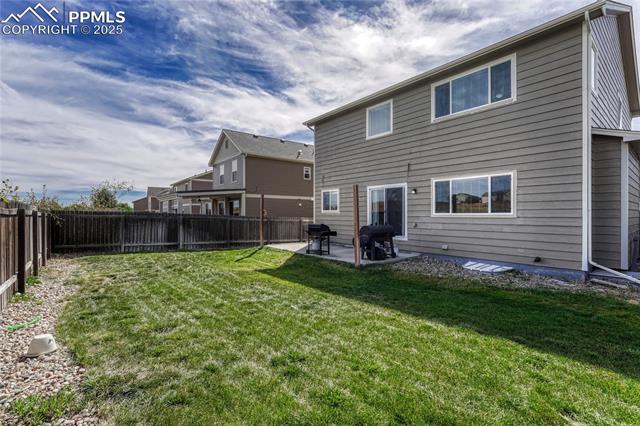 2215 Reed Grass Way Colorado Springs, CO 80915 - Photo 8 of 50 Backyard with patio