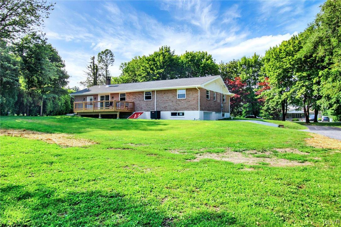 760 Carney Road Kunkletown, PA 18058 - Photo 34 of 36 a view of a house with a big yard and large trees