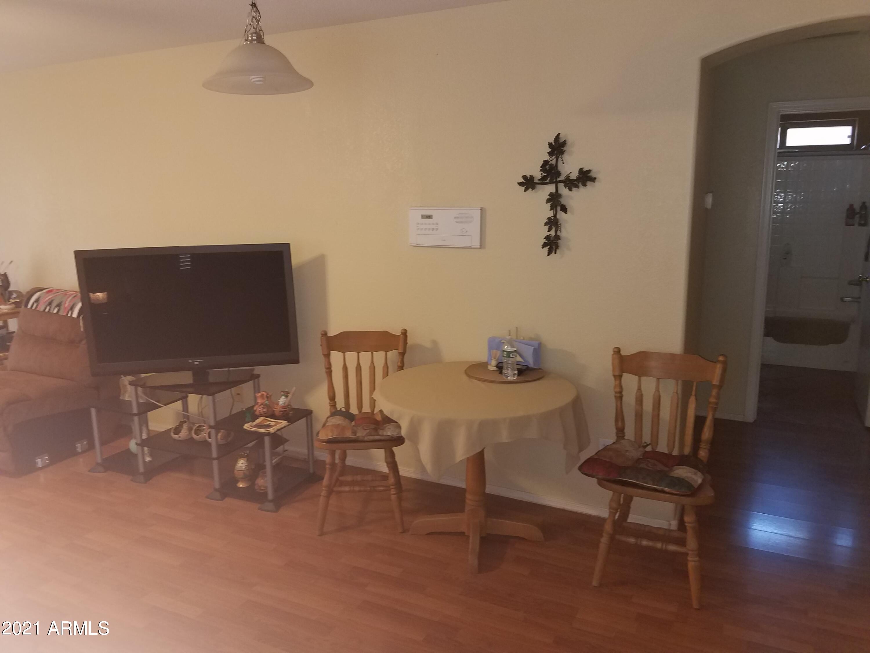 15025 West Calavar Road Surprise, AZ 85379 - Photo 5 of 13 Dining in Great Room