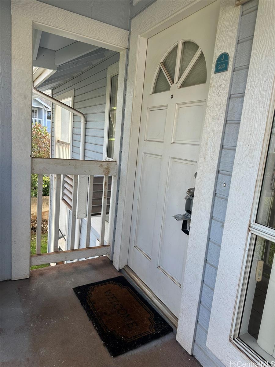 94-209 Lumiaina Place, Unit J203 Waipahu, HI 96797 - Photo 17 of 19 a view of front door