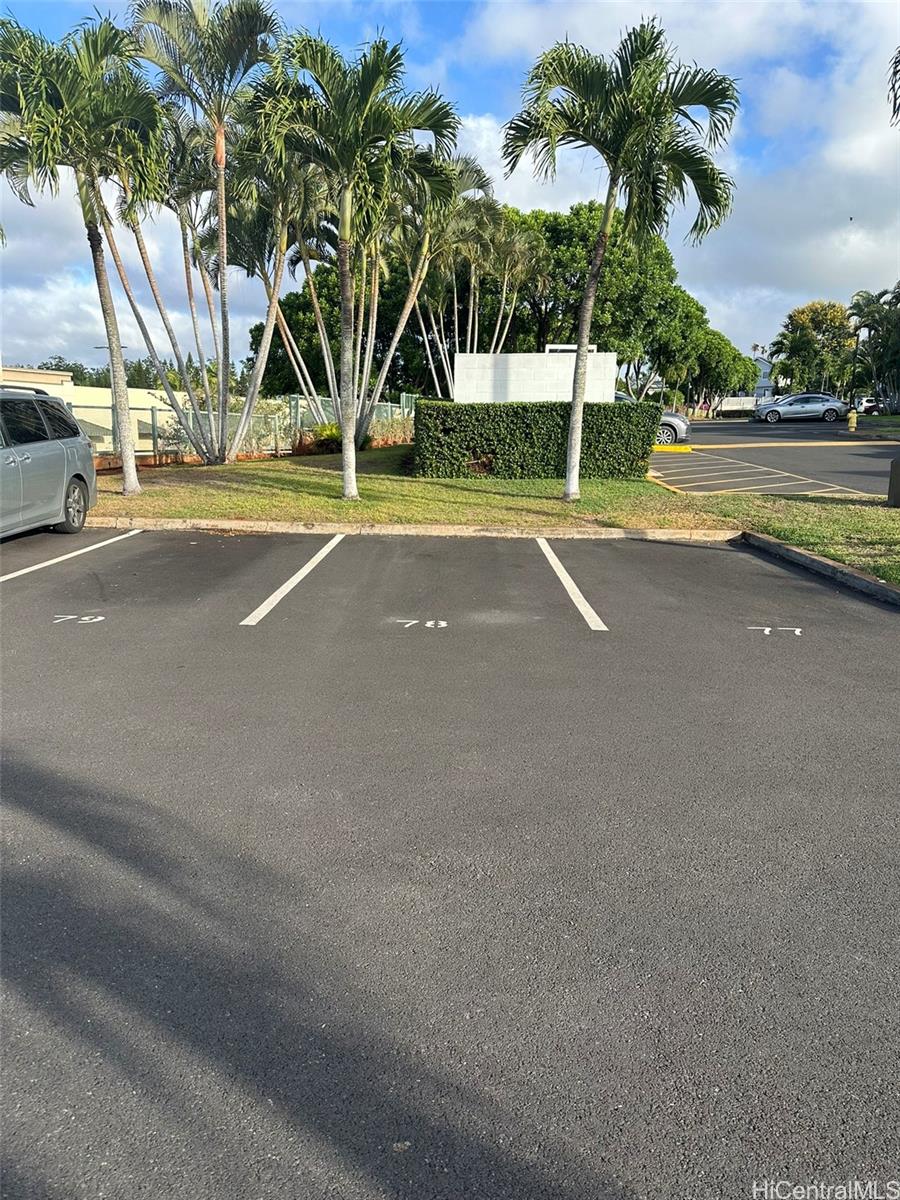 94-209 Lumiaina Place, Unit J203 Waipahu, HI 96797 - Photo 19 of 19 a view of a street with houses