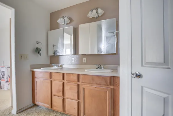 a bathroom with a tub and sink