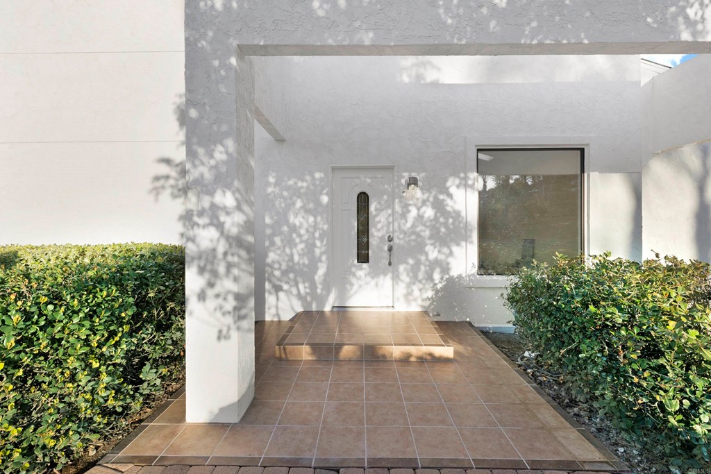 12032 Serena Road Lakeside, CA 92040 - Photo 11 of 55 a lobby with furniture and potted plant