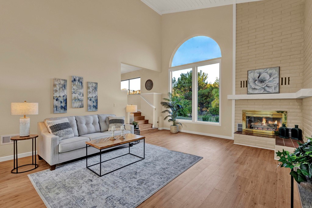 12032 Serena Road Lakeside, CA 92040 - Photo 15 of 55 a living room with furniture and a fireplace