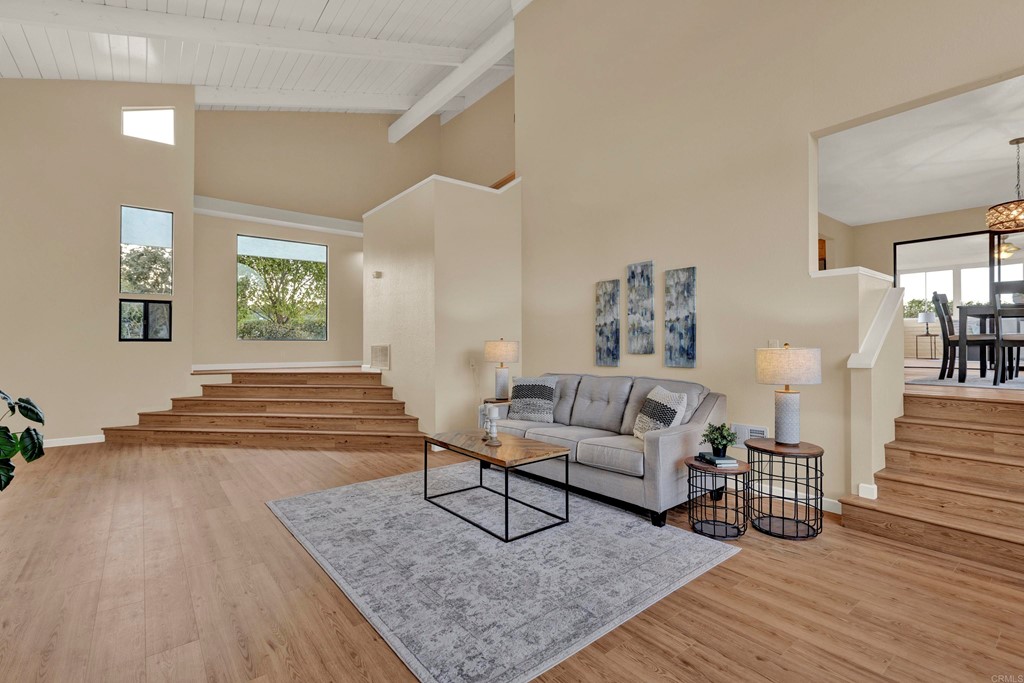 12032 Serena Road Lakeside, CA 92040 - Photo 16 of 55 a living room with furniture and wooden floor
