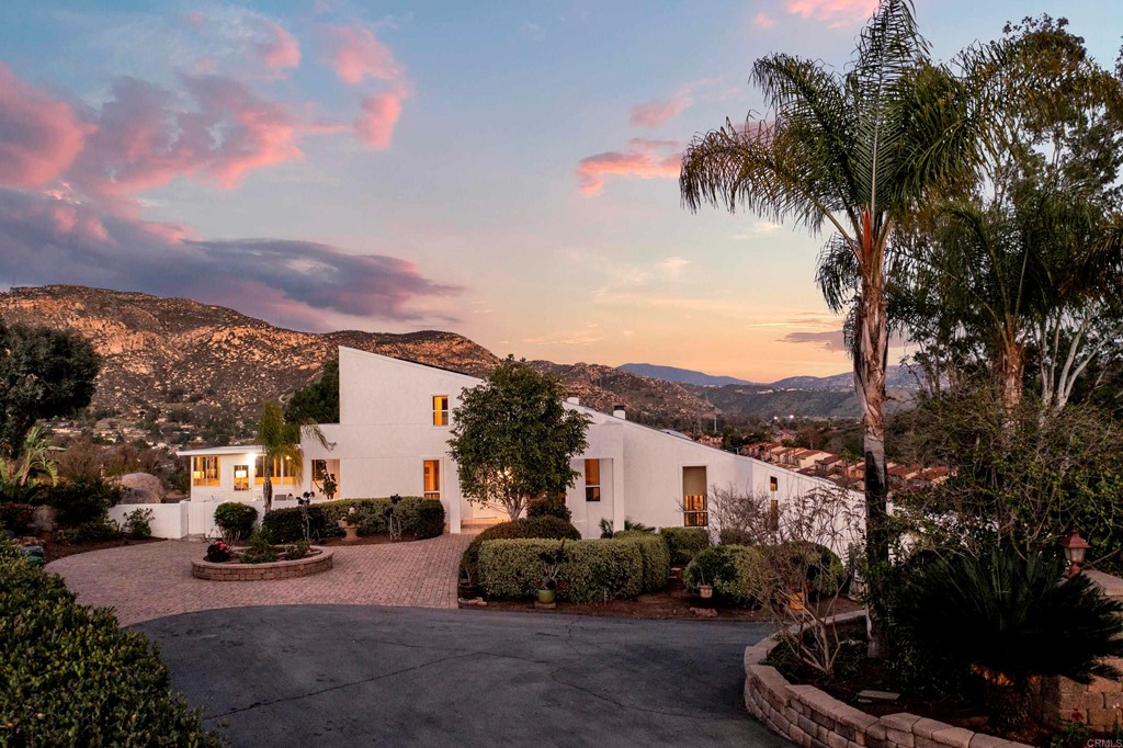 12032 Serena Road Lakeside, CA 92040 - Photo 2 of 55 a view of a street with a house in the background