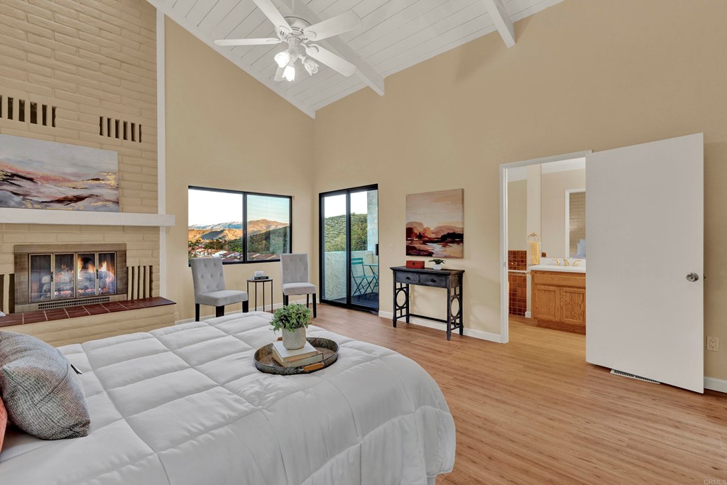 12032 Serena Road Lakeside, CA 92040 - Photo 28 of 55 a living room with furniture and a fireplace